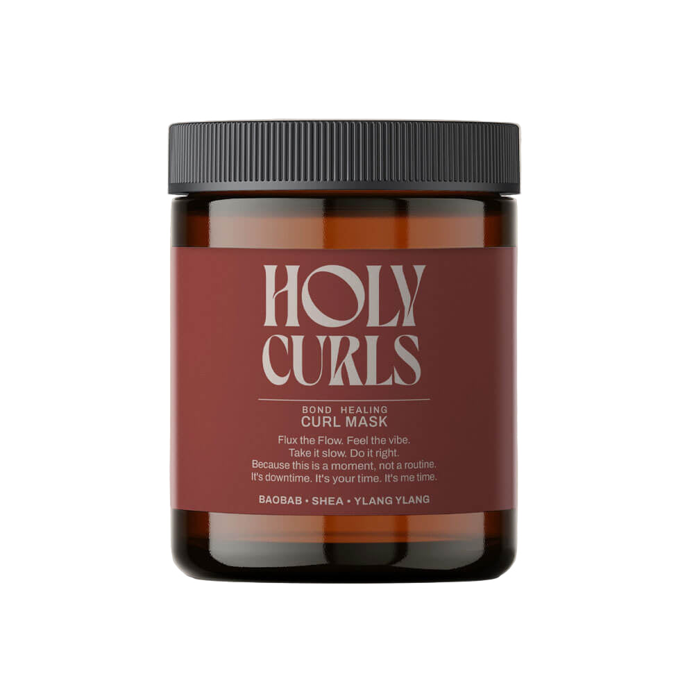 Jar of Holy Curls hair mask on a white background