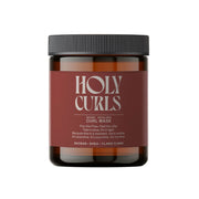Jar of Holy Curls hair mask on a white background