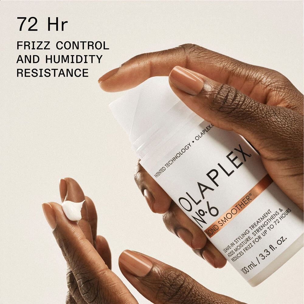 Olaplex hair product being applied with text on frizz control and humidity resistance.