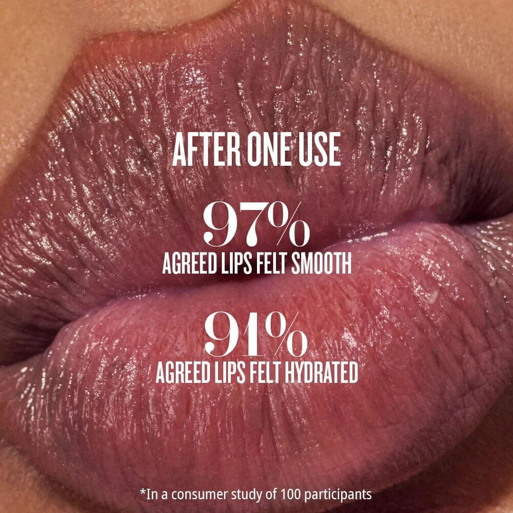 Close-up of glossy lips with text indicating product effectiveness on lips.