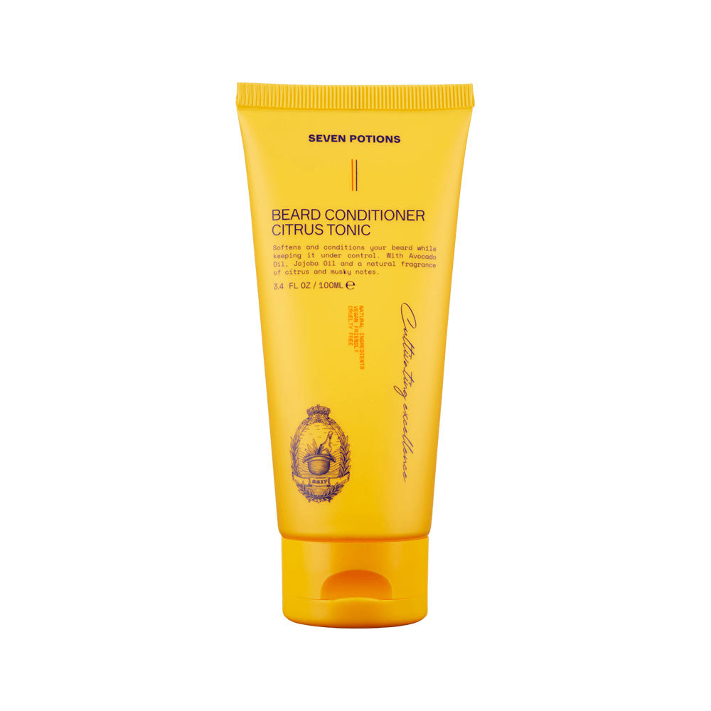 Yellow tube of beard conditioner with branding on a white background