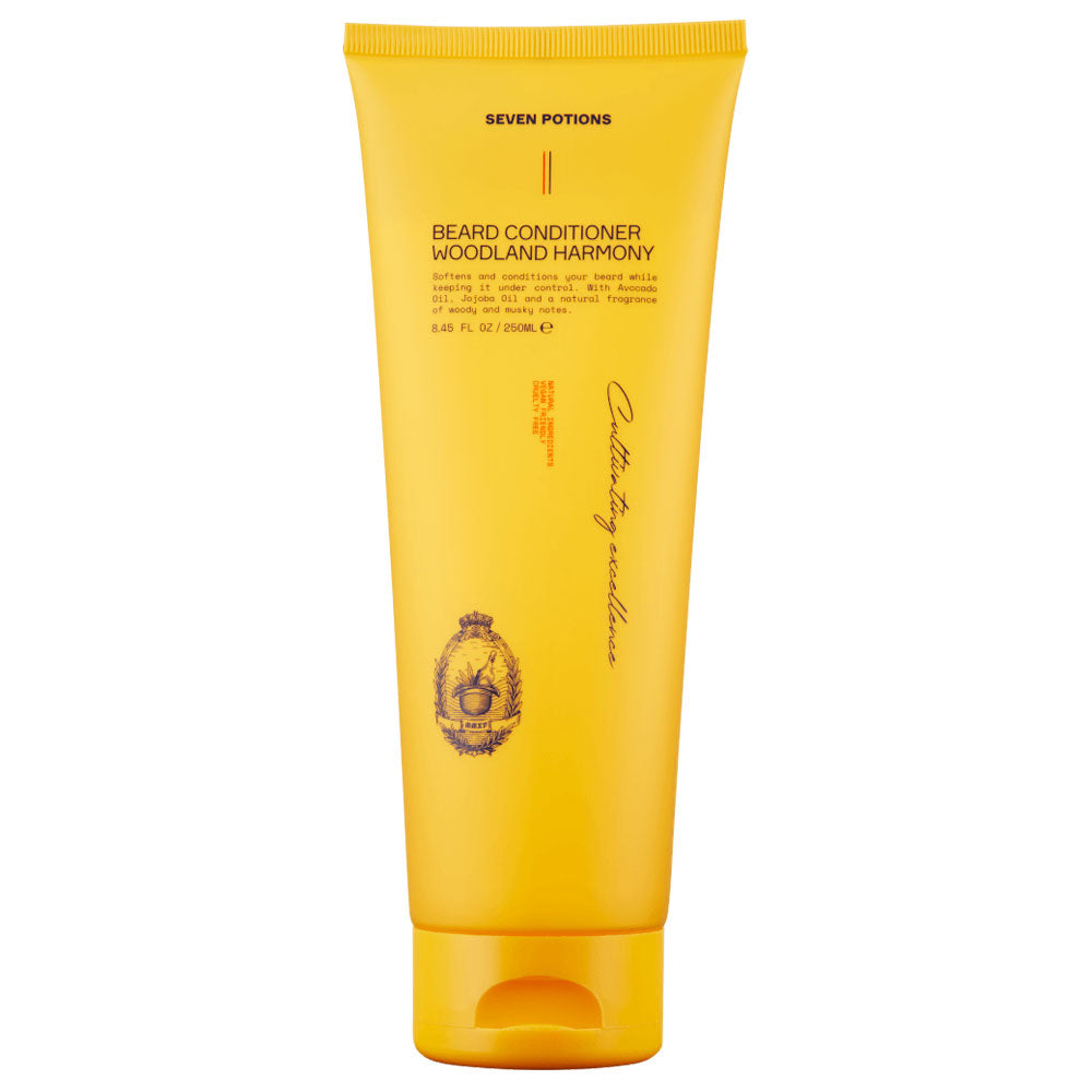 Yellow tube of Seven Potions Beard Conditioner on a white background