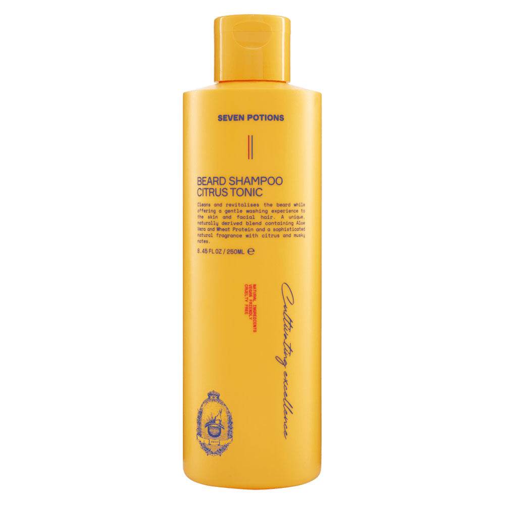 Yellow bottle of Seven Potions beard shampoo on a white background