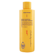 Yellow bottle of Seven Potions Woodland Harmony beard shampoo on a white background