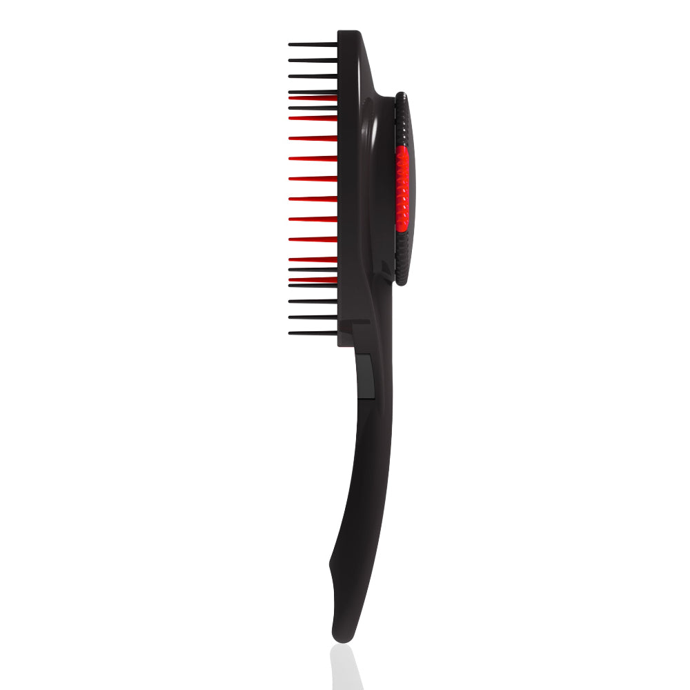 Black hairbrush with red bristle tips on a white background