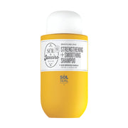Yellow shampoo bottle with white label on a white background