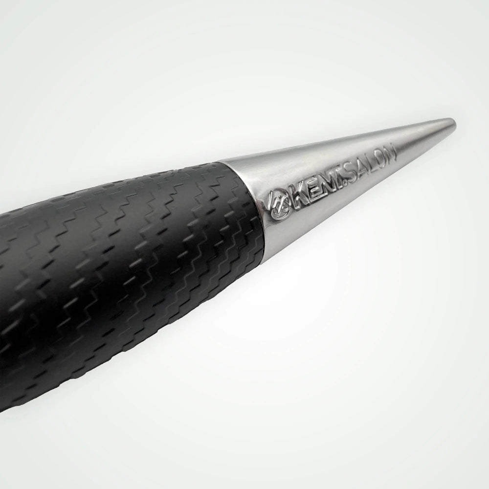 Close-up of a black pen with a metallic tip on a white background