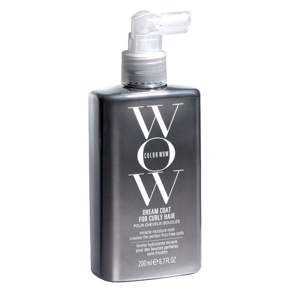 Bottle of WOW Color Wow Dream Coat for curly hair on a light gray background