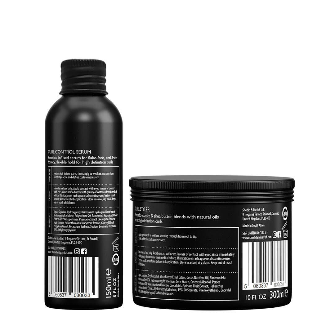 Black bottle and jar of hair care product with labels on a white background