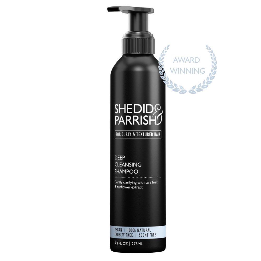 Black shampoo bottle with 'Shedid Parrish' branding on a white background