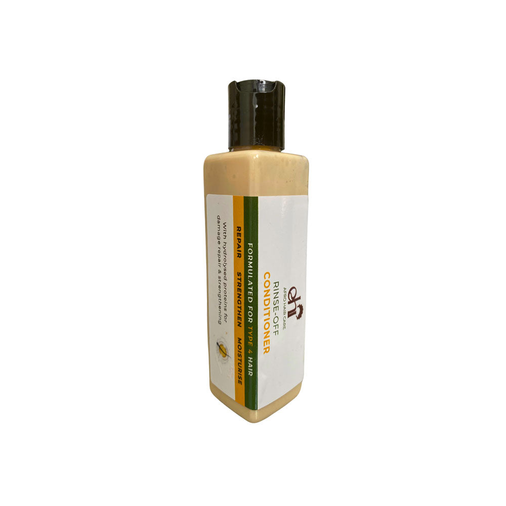 Bottle of conditioner with a white label on a white background