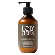 Bottle of Holy Curls conditioner with a pump on a light gray background