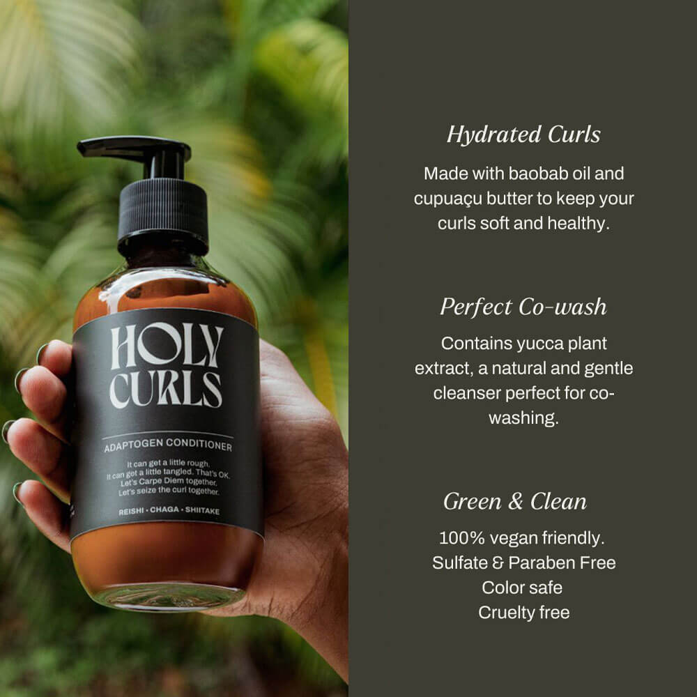 Hand holding a bottle of 'Holy Curls' conditioner with product details on a green leafy background