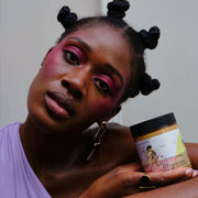 Woman holding a jar of cosmetic product with a neutral background