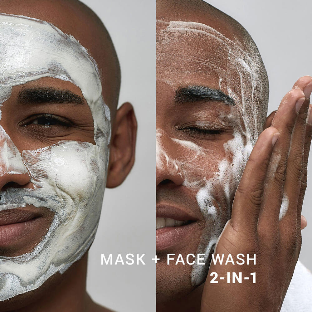 Two men applying a mask and face wash 2-in-1 product to their faces.