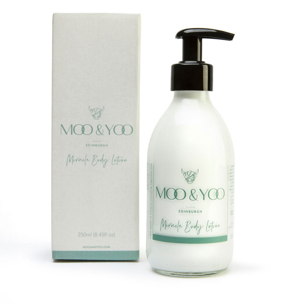 Moo & Yoo body lotion with pump and packaging on a white background