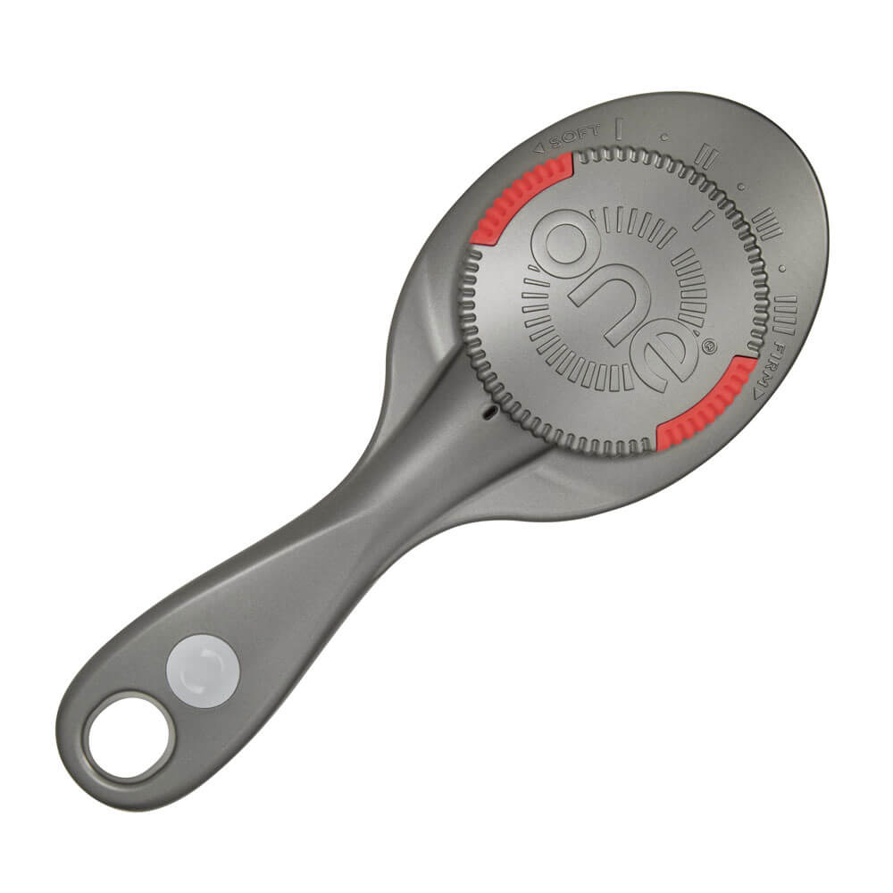 Gray kitchen tool with a handle and circular design on a white background