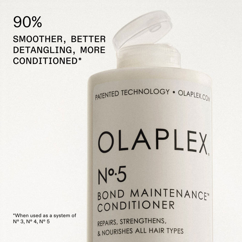 Olaplex No.5 Bond Maintenance Conditioner bottle on a light gray background