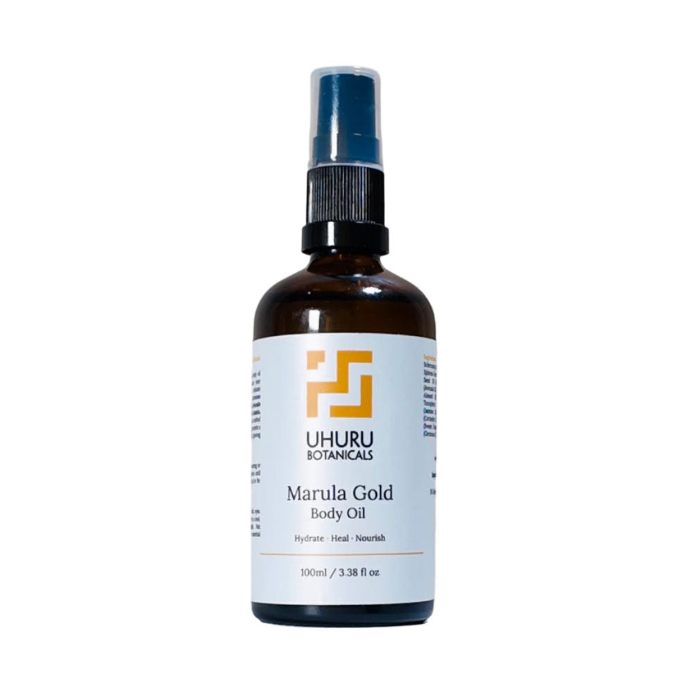 UHURU Botanicals Marula Gold Body Oil bottle on a white background