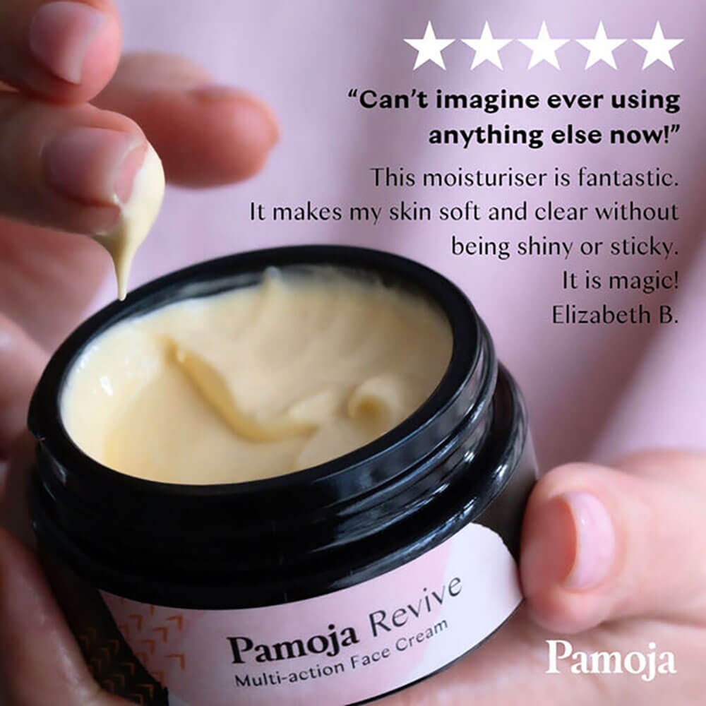 Pamoja Revive Multi-action Face Cream with a hand applying cream and a five-star review.