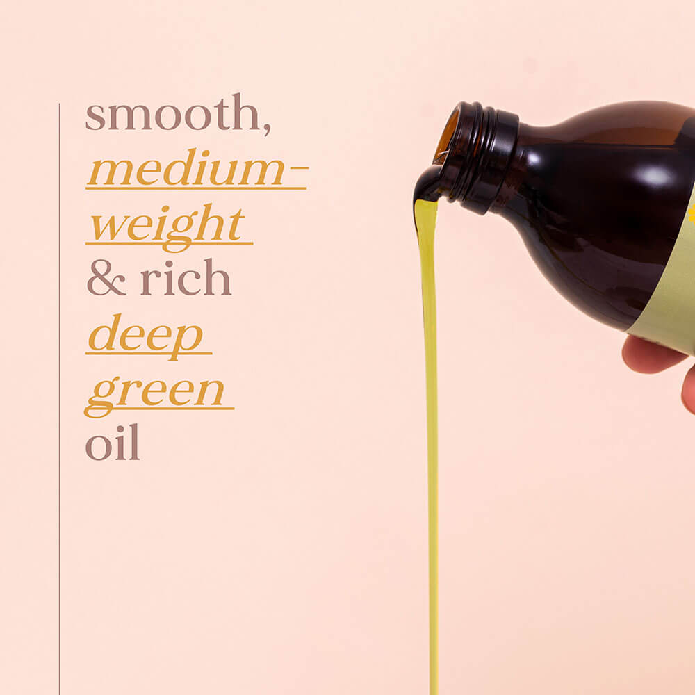 Brown bottle pouring green oil onto a beige background with text describing the oil's qualities.