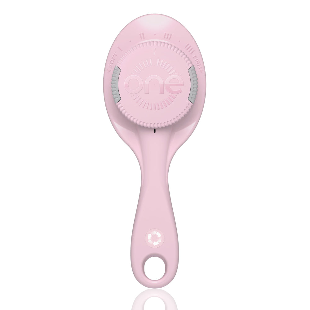 Pink adjustable hairbrush with 'Clic One' branding on a white background