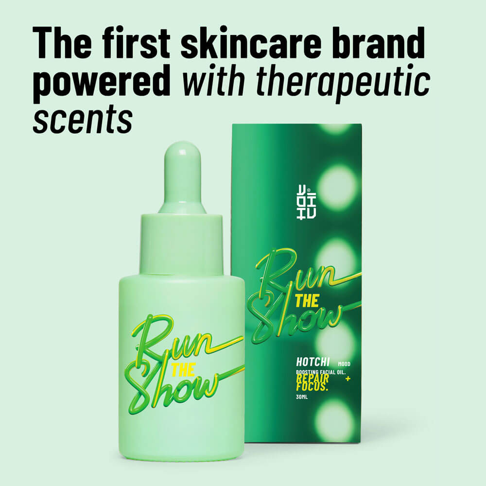 Skincare product and packaging with 'Run The Show' branding on a light green background