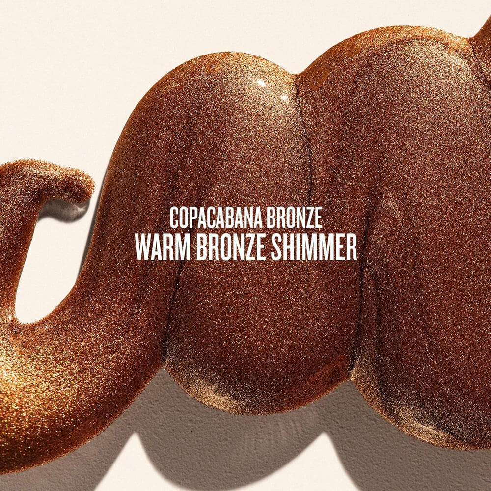 Bronze glittery product with 'Copacabana Bronze Warm Bronze Shimmer' text on a neutral background
