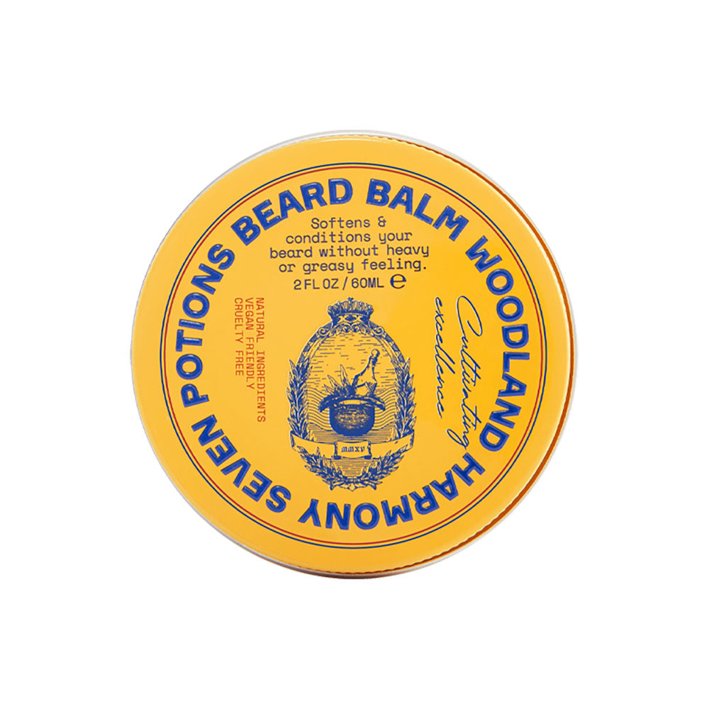 Yellow container of Seven Potions Beard Balm Woodland Harmony on a white background