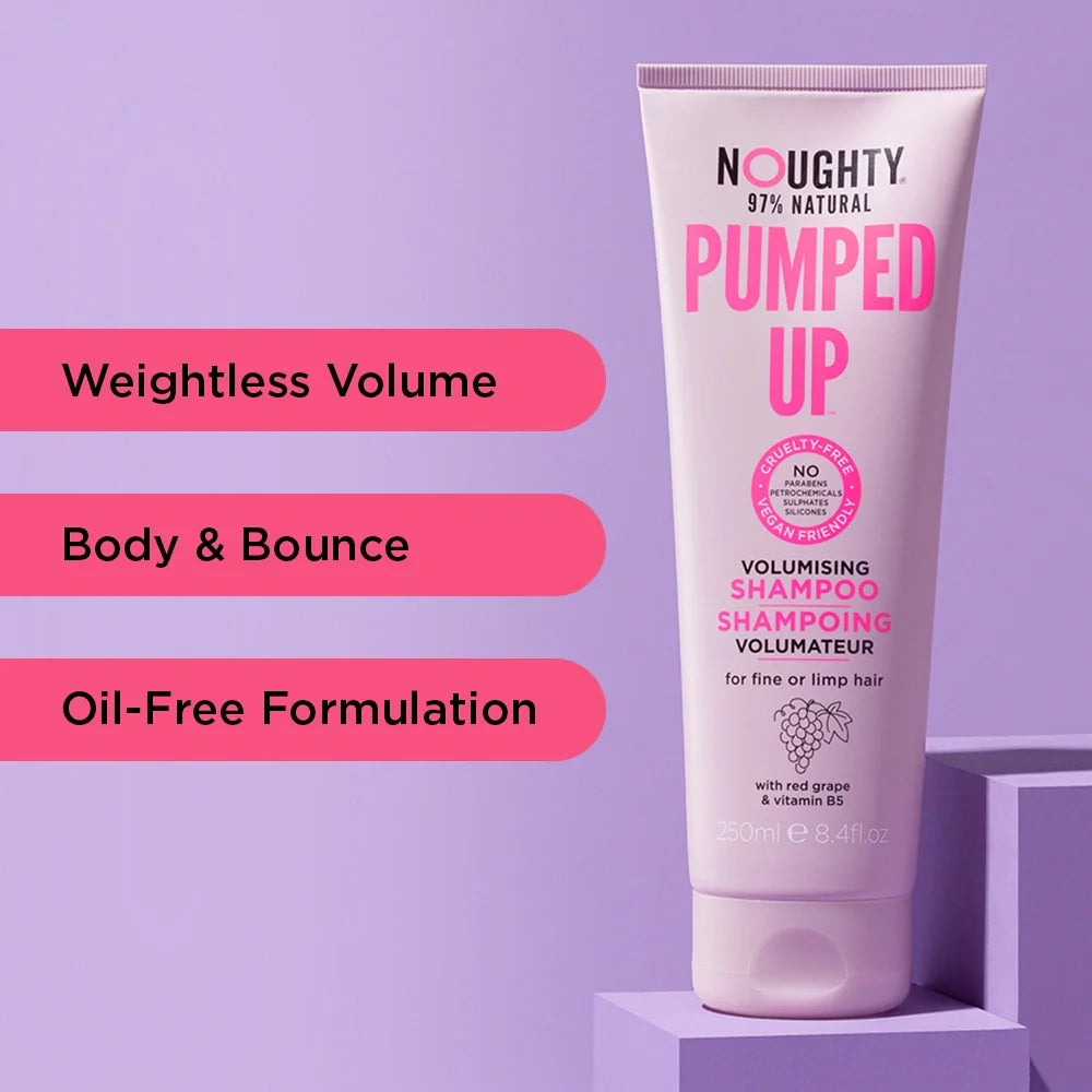 Tube of Noughty Pumped Up Volumising Shampoo on a purple background with product features listed.