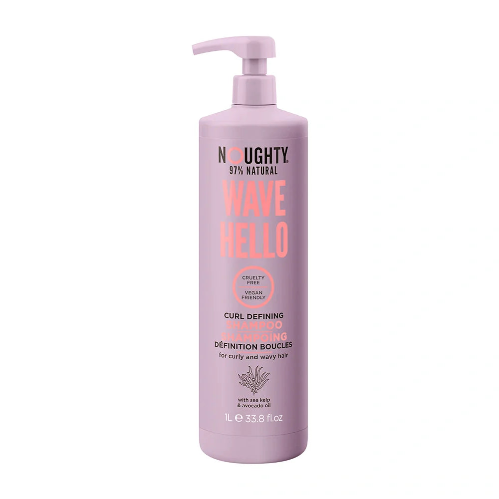 Pink bottle of 'NØughty' hair product on a white background