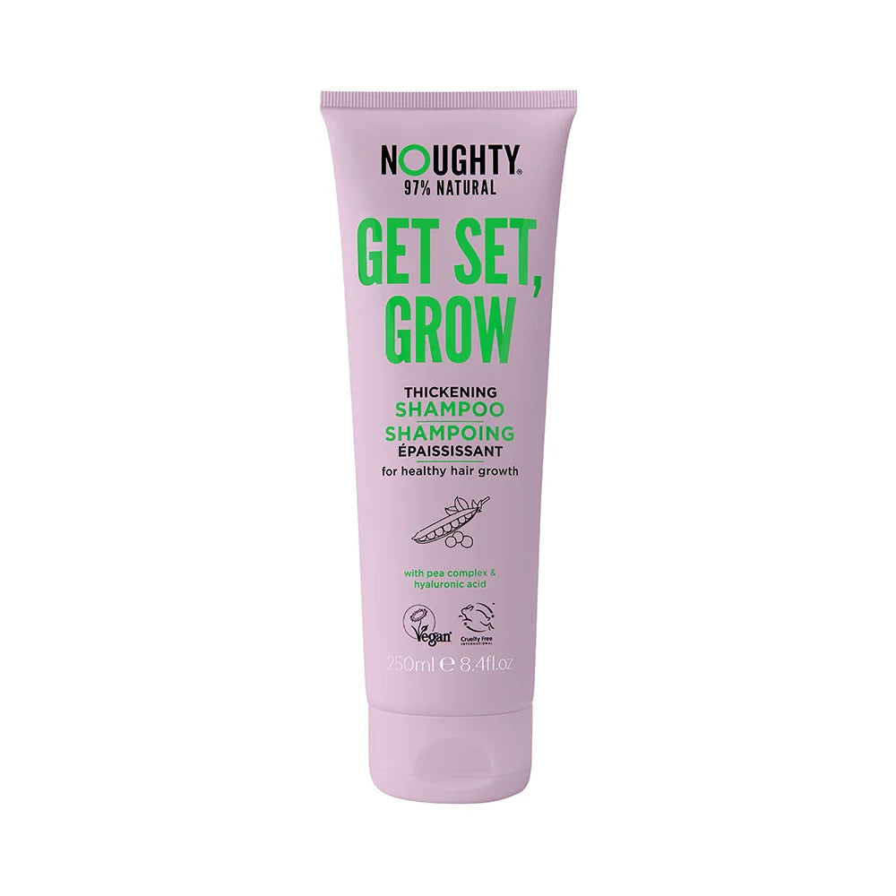 Purple shampoo bottle labeled 'Noughty Get Set, Grow' on a white background