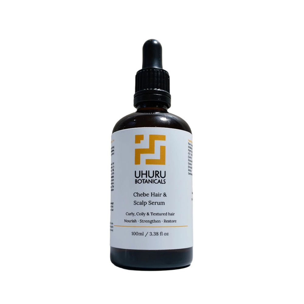 Uhuru Botanicals Chebe Hair & Scalp Serum bottle on a white background