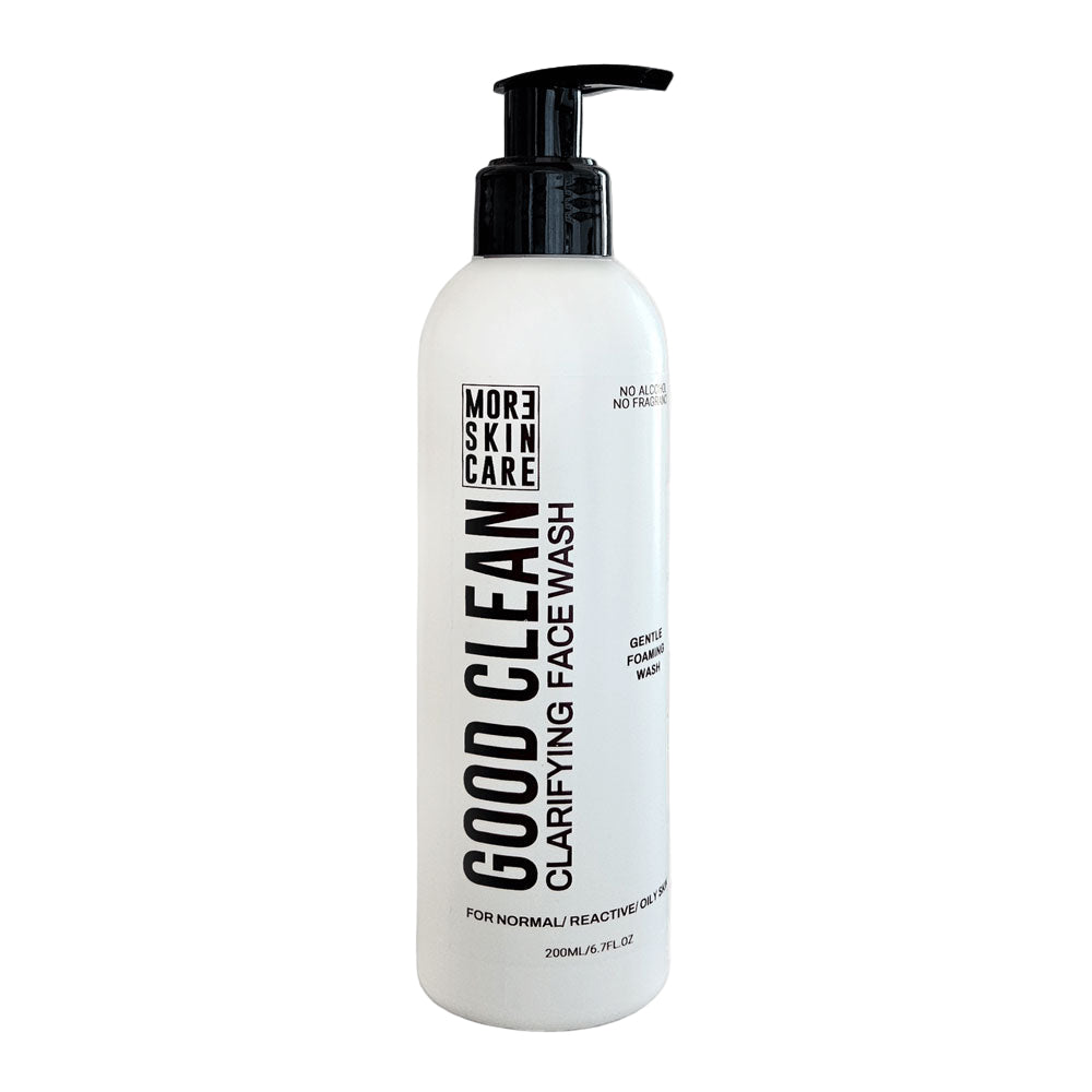 Bottle of 'Good Clean' clarifying face wash on a white background