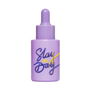 Purple bottle with 'Slay All Day' text on a light purple background